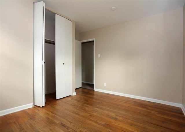 1107 Croxall Ave, Hopewell Twp Bea, PA 15001 - unfurnished bedroom featuring wood finished floors, baseboards, and a closet