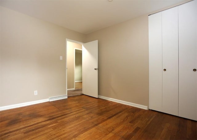 1107 Croxall Ave, Hopewell Twp Bea, PA 15001 - unfurnished bedroom with wood finished floors, baseboards, and a closet