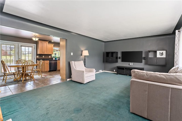 225 Larson Blvd, Rostraver, PA 15012 - living area featuring carpet flooring, tile patterned floors, and baseboards