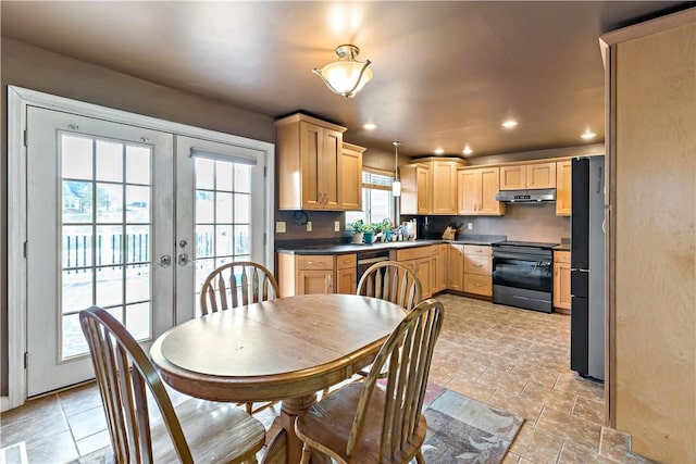 225 Larson Blvd, Rostraver, PA 15012 - kitchen featuring black range with electric stovetop, light brown cabinets, stainless steel dishwasher, under cabinet range hood, and freestanding refrigerator