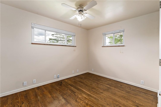 225 Larson Blvd, Rostraver, PA 15012 - unfurnished room with baseboards, dark wood-style flooring, and ceiling fan