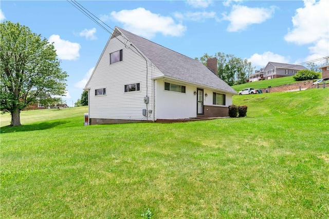 225 Larson Blvd, Rostraver, PA 15012 - view of side of home with a chimney, a yard, and a shingled roof