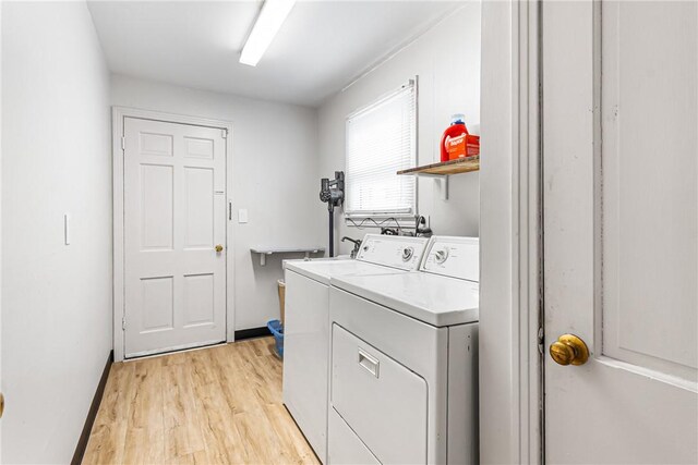 1900 Ardmore Blvd, Forest Hills Boro, PA 15221 - laundry room with washer and dryer, light wood-type flooring, and baseboards