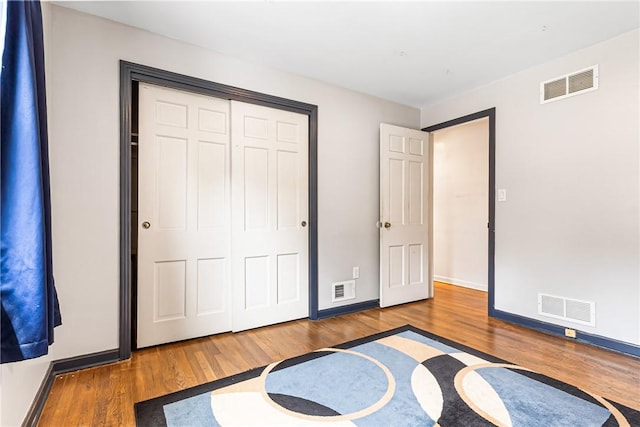 1900 Ardmore Blvd, Forest Hills Boro, PA 15221 - unfurnished bedroom featuring wood finished floors, baseboards, and a closet
