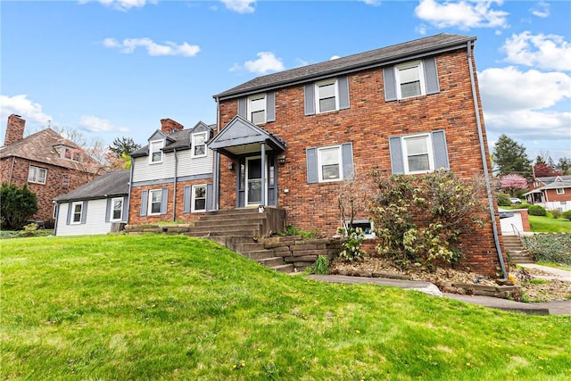 1900 Ardmore Blvd, Forest Hills Boro, PA 15221 - view of front of house featuring a front lawn and brick siding