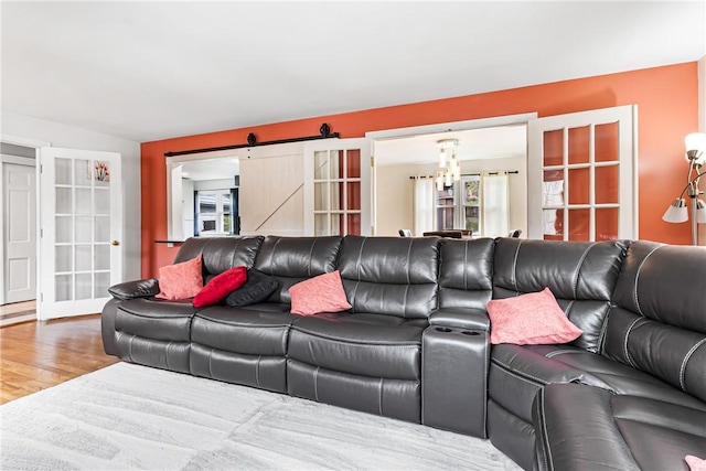 1900 Ardmore Blvd, Forest Hills Boro, PA 15221 - living room with wood finished floors and a barn door
