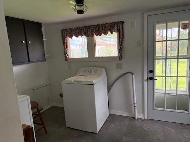 15 Miner Ave, Bentleyville, PA 15314 - laundry room with washer / clothes dryer, baseboards, and cabinet space