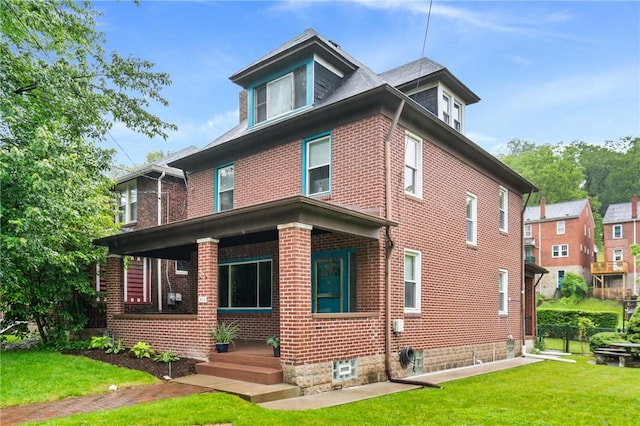 404 Lenox Ave, Forest Hills Boro, PA 15221 - view of front of property with brick siding, a front yard, and covered porch