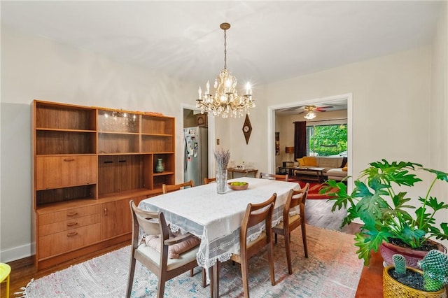 404 Lenox Ave, Forest Hills Boro, PA 15221 - dining area with light wood-style floors, a chandelier, and baseboards