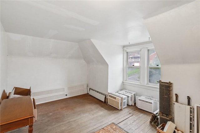 404 Lenox Ave, Forest Hills Boro, PA 15221 - bonus room featuring a baseboard radiator, wood-type flooring, and lofted ceiling