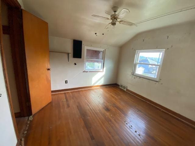 923 7th Ave, Elizabeth Twp/Boro, PA 15037 - unfurnished room with vaulted ceiling, a ceiling fan, wood finished floors, and baseboards