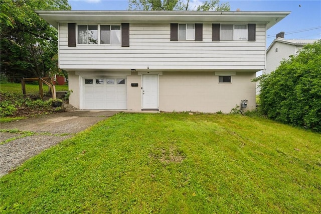 233 6th St, California, PA 15419 - view of front facade with an attached garage, driveway, and a front yard