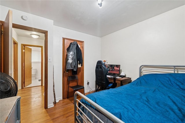 233 6th St, California, PA 15419 - bedroom with light wood finished floors and baseboards