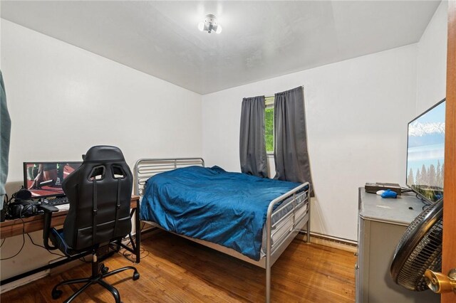 233 6th St, California, PA 15419 - bedroom with wood finished floors and a desk