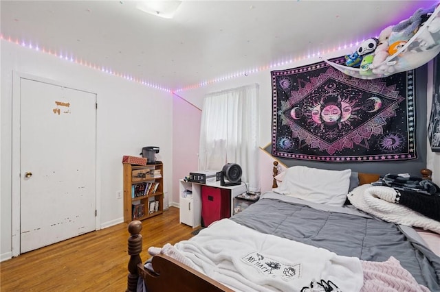 233 6th St, California, PA 15419 - bedroom featuring wood finished floors and baseboards