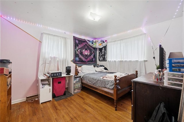233 6th St, California, PA 15419 - bedroom with wood finished floors and baseboards