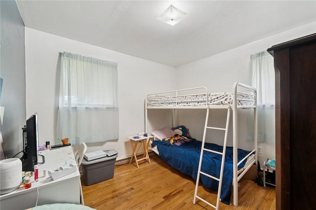 233 6th St, California, PA 15419 - bedroom with wood finished floors and a desk