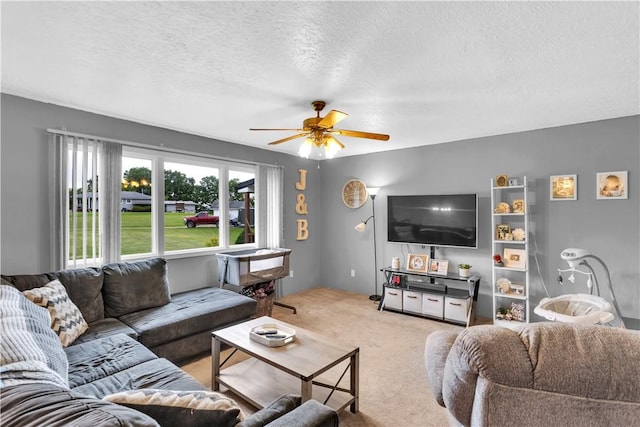 536 Hopewell Rd, Luzerne Twp, PA 15433 - carpeted living room featuring ceiling fan and a textured ceiling