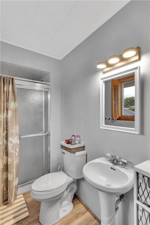 536 Hopewell Rd, Luzerne Twp, PA 15433 - bathroom with a shower stall, toilet, and wood finished floors