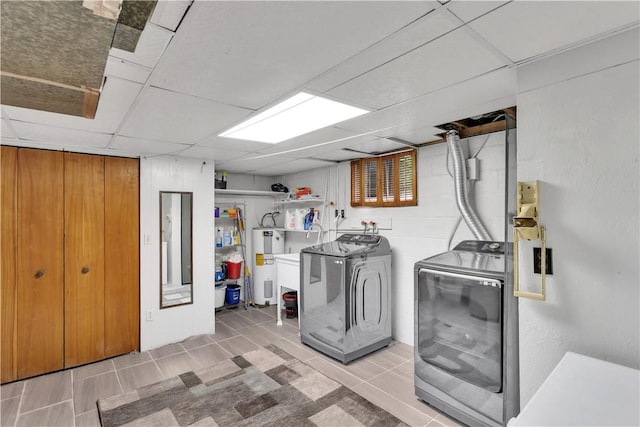536 Hopewell Rd, Luzerne Twp, PA 15433 - washroom featuring separate washer and dryer and water heater