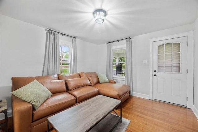 190 Elm St, Daugherty Twp, PA 15066 - living area with healthy amount of natural light, light wood finished floors, and baseboards