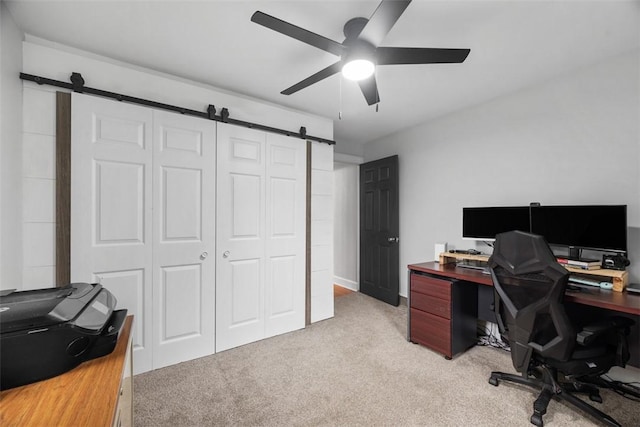 190 Elm St, Daugherty Twp, PA 15066 - home office with a barn door, light carpet, and ceiling fan