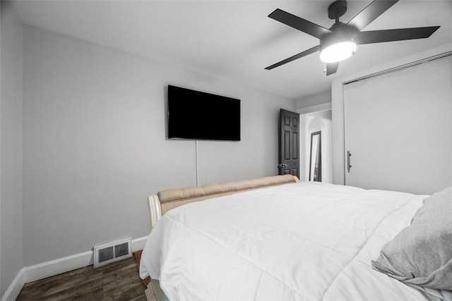190 Elm St, Daugherty Twp, PA 15066 - bedroom featuring baseboards, wood finished floors, ceiling fan, and a closet