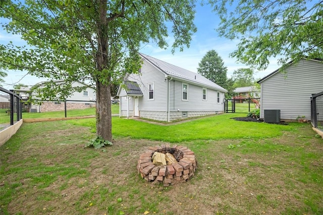 190 Elm St, Daugherty Twp, PA 15066 - view of yard with an outdoor fire pit and central AC unit