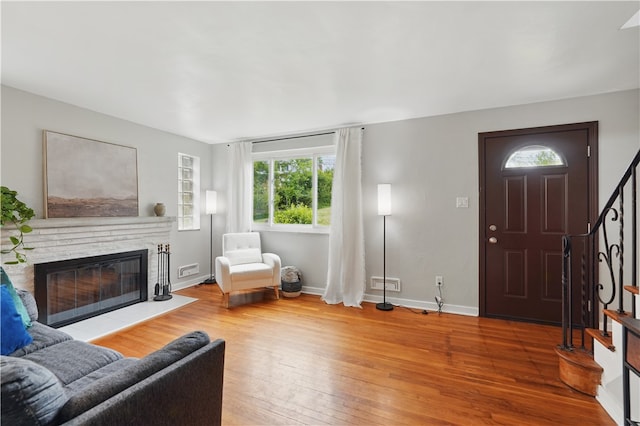 9440 Peebles Rd, Mccandless, PA 15101 - living room with plenty of natural light, hardwood / wood-style flooring, and stairway