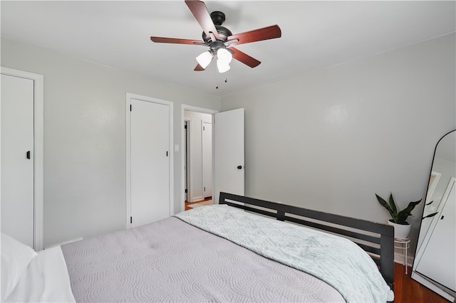 9440 Peebles Rd, Mccandless, PA 15101 - bedroom with ceiling fan and dark wood-style floors