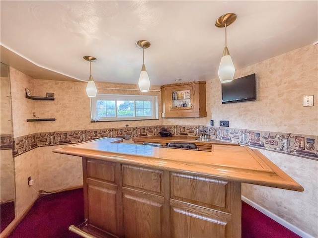 3181 Mellott Rd, Baldwin Boro, PA 15227 - kitchen featuring dark carpet, pendant lighting, light countertops, and wallpapered walls