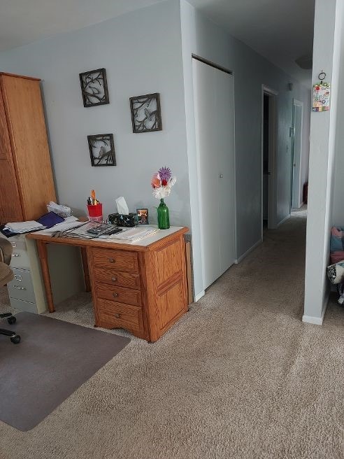 1046 Elicker Rd, Plum Boro, PA 15068 - office space featuring light colored carpet, built in desk, and baseboards