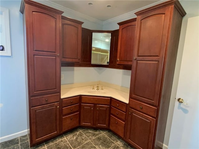 600 Moore Rd, South Franklin, PA 15301 - kitchen featuring a sink, light countertops, baseboards, ornamental molding, and glass insert cabinets