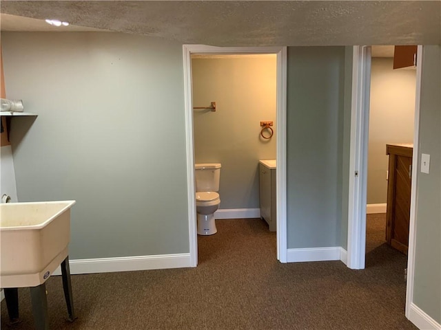 600 Moore Rd, South Franklin, PA 15301 - bathroom with toilet, vanity, baseboards, and a textured ceiling