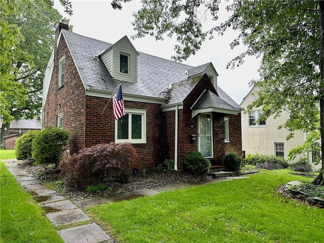 3301 Hazelhurst Ave, Baldwin Boro, PA 15227 - view of front of property featuring brick siding, a chimney, a front yard, and a high end roof