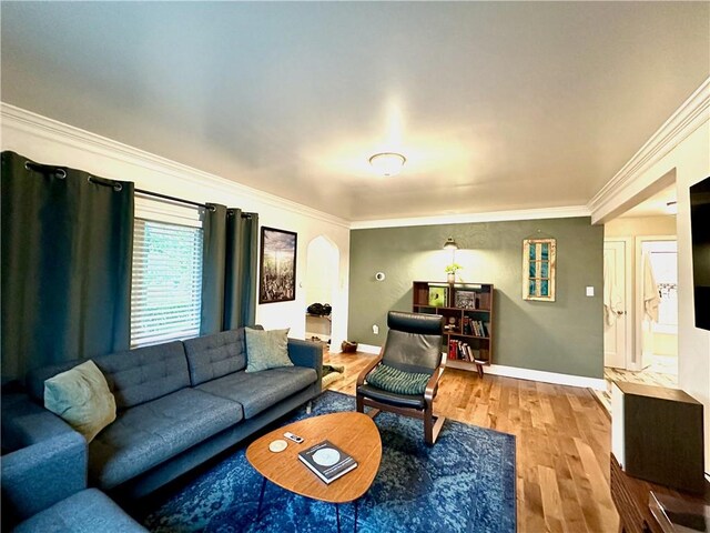 3301 Hazelhurst Ave, Baldwin Boro, PA 15227 - living room with wood finished floors, arched walkways, crown molding, and baseboards