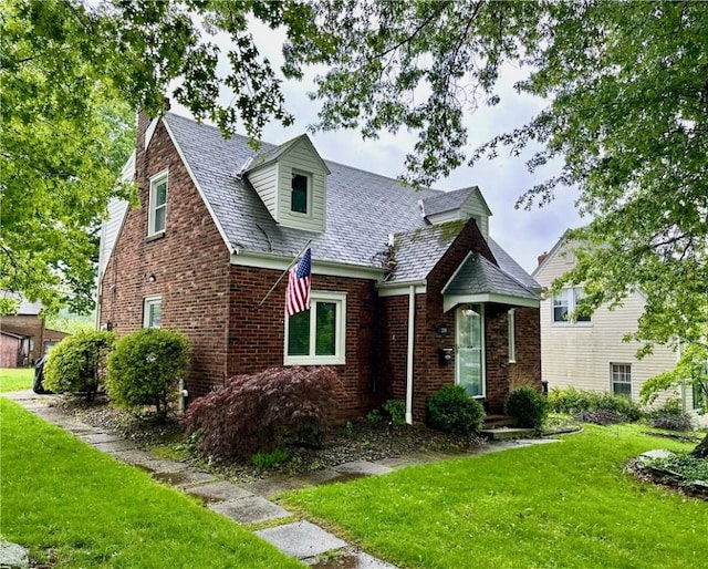 3301 Hazelhurst Ave, Baldwin Boro, PA 15227 - view of front of property with brick siding, a chimney, and a front lawn