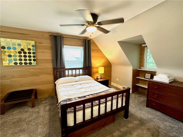 3301 Hazelhurst Ave, Baldwin Boro, PA 15227 - bedroom featuring wood walls, multiple windows, carpet, vaulted ceiling, and a ceiling fan