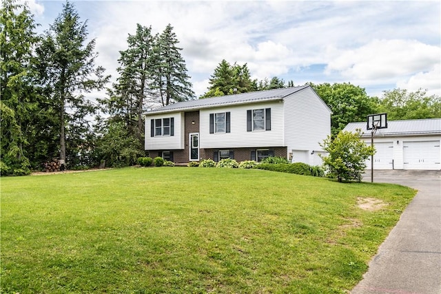 229 Holyoke Rd, Center Twp But, PA 16001 - raised ranch featuring a front yard, a garage, and metal roof