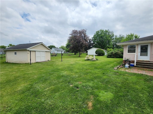 1013 Charles Dr, Union Twp Law, PA 16101 - view of grassy yard featuring an outbuilding and entry steps
