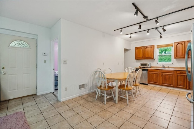 2883 Wilson St N, Franklin Twp, PA 15301 - dining room with light tile patterned floors, baseboards, and track lighting