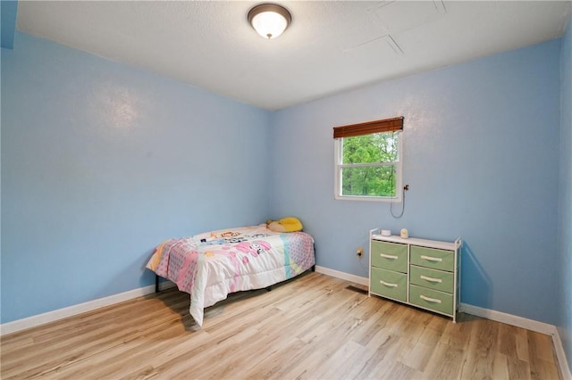 2883 Wilson St N, Franklin Twp, PA 15301 - bedroom with light wood-style flooring and baseboards