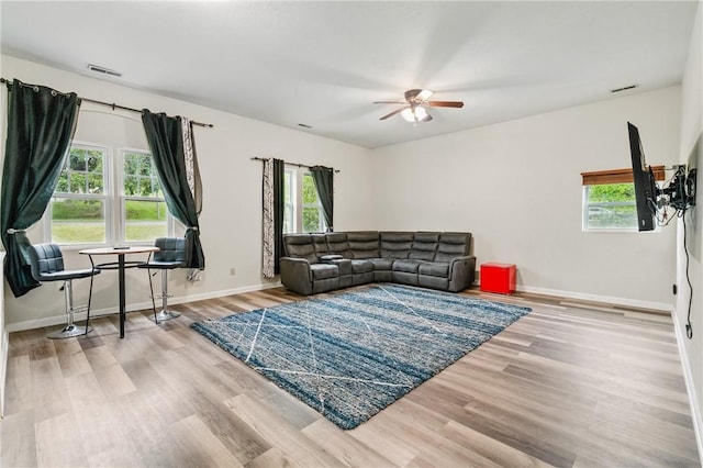 2883 Wilson St N, Franklin Twp, PA 15301 - living room with healthy amount of natural light, wood finished floors, and a ceiling fan