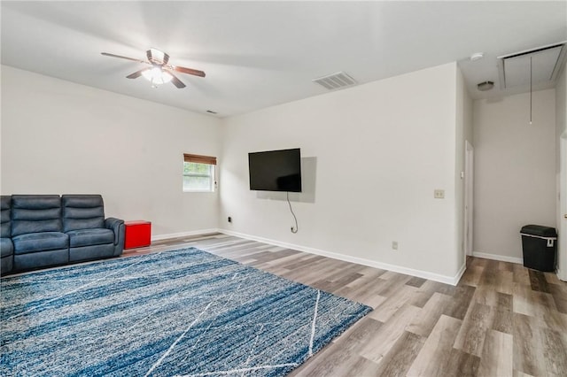 2883 Wilson St N, Franklin Twp, PA 15301 - living area with attic access, wood finished floors, a ceiling fan, and baseboards