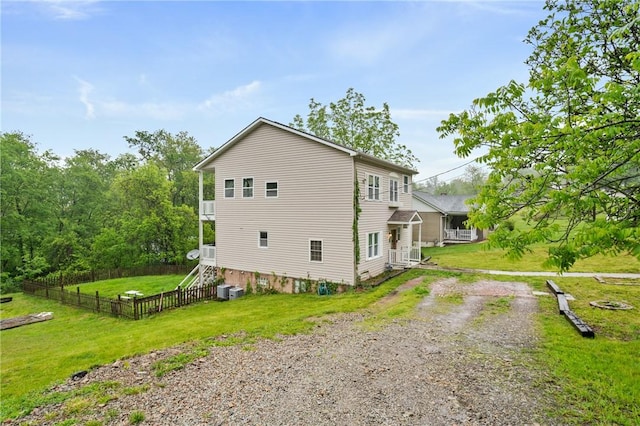2883 Wilson St N, Franklin Twp, PA 15301 - view of property exterior featuring dirt driveway, cooling unit, and stairs