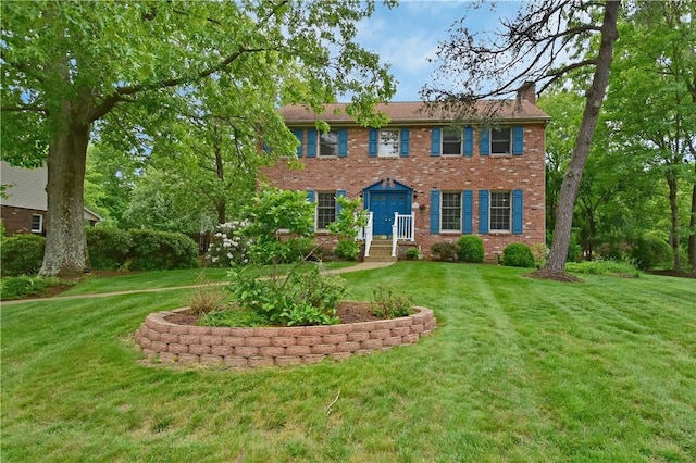 412 Forest Trails Dr, Mccandless, PA 15090 - colonial house with a front lawn, brick siding, and a chimney