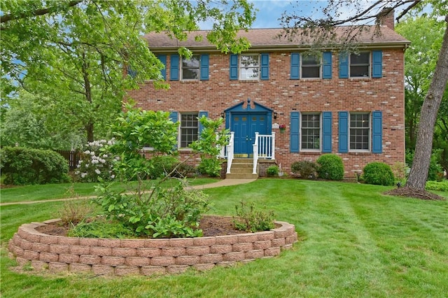 412 Forest Trails Dr, Mccandless, PA 15090 - colonial inspired home with a front lawn, a chimney, and brick siding