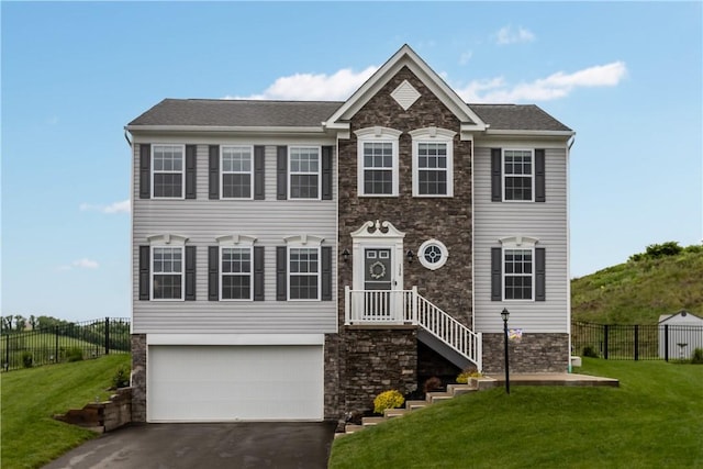136 Azalea Cir, Belle Vernon Wml, PA 15012 - view of front of home with stone siding, a garage, and driveway