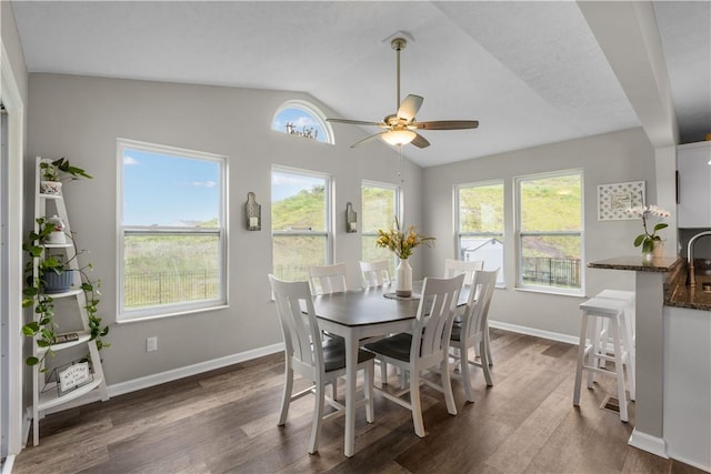 136 Azalea Cir, Belle Vernon Wml, PA 15012 - dining area with vaulted ceiling, a ceiling fan, healthy amount of natural light, and dark wood-style flooring