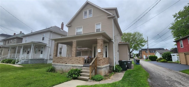 117 Glen Ave, Ellwood City Law, PA 16117 - view of front of property featuring a porch and a front lawn